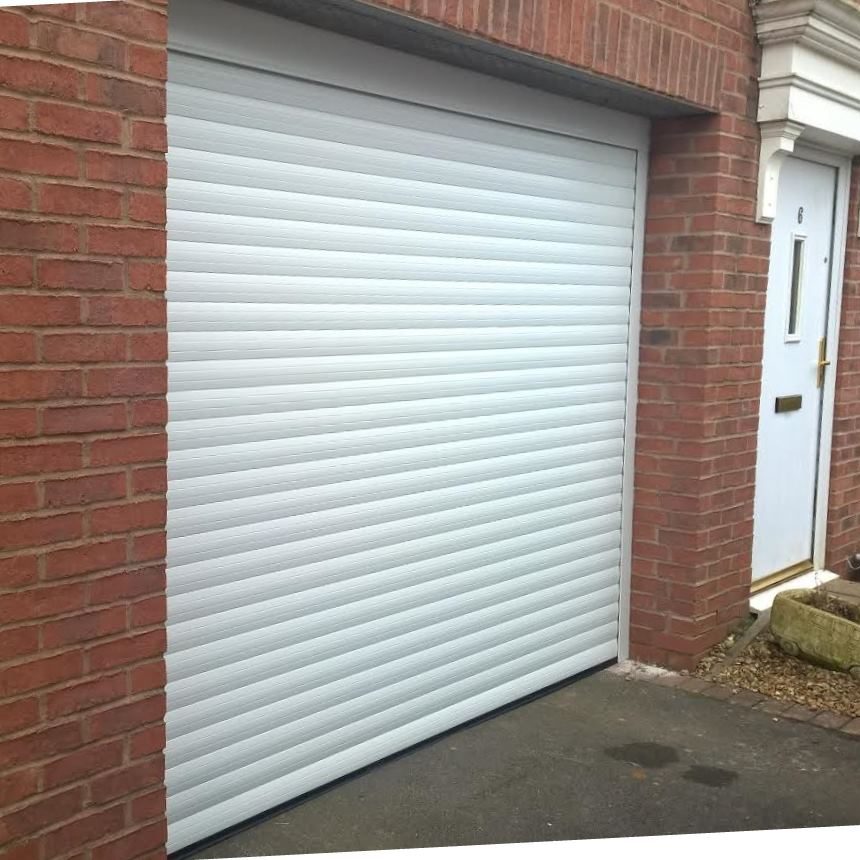 Automated garage door installed to car port - Elite GD